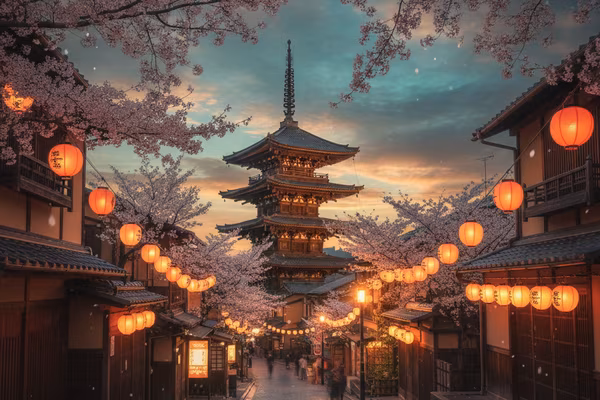 Kyoto pagoda above a lantern-lit street at night