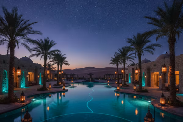 Moroccan desert oasis with lanterns under stars