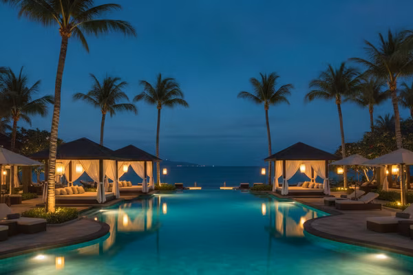 Cancún beachfront resort pool at night